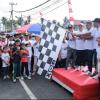 3.000 Tiket Dorprize Dibagikan, Antusiasme Warga Meureubo Warnai Jalan Santai HUT RI ke-80
